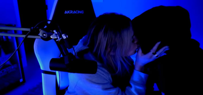 ©youtube.com/adinross | Adin Ross kisses Corinna during a live stream. 